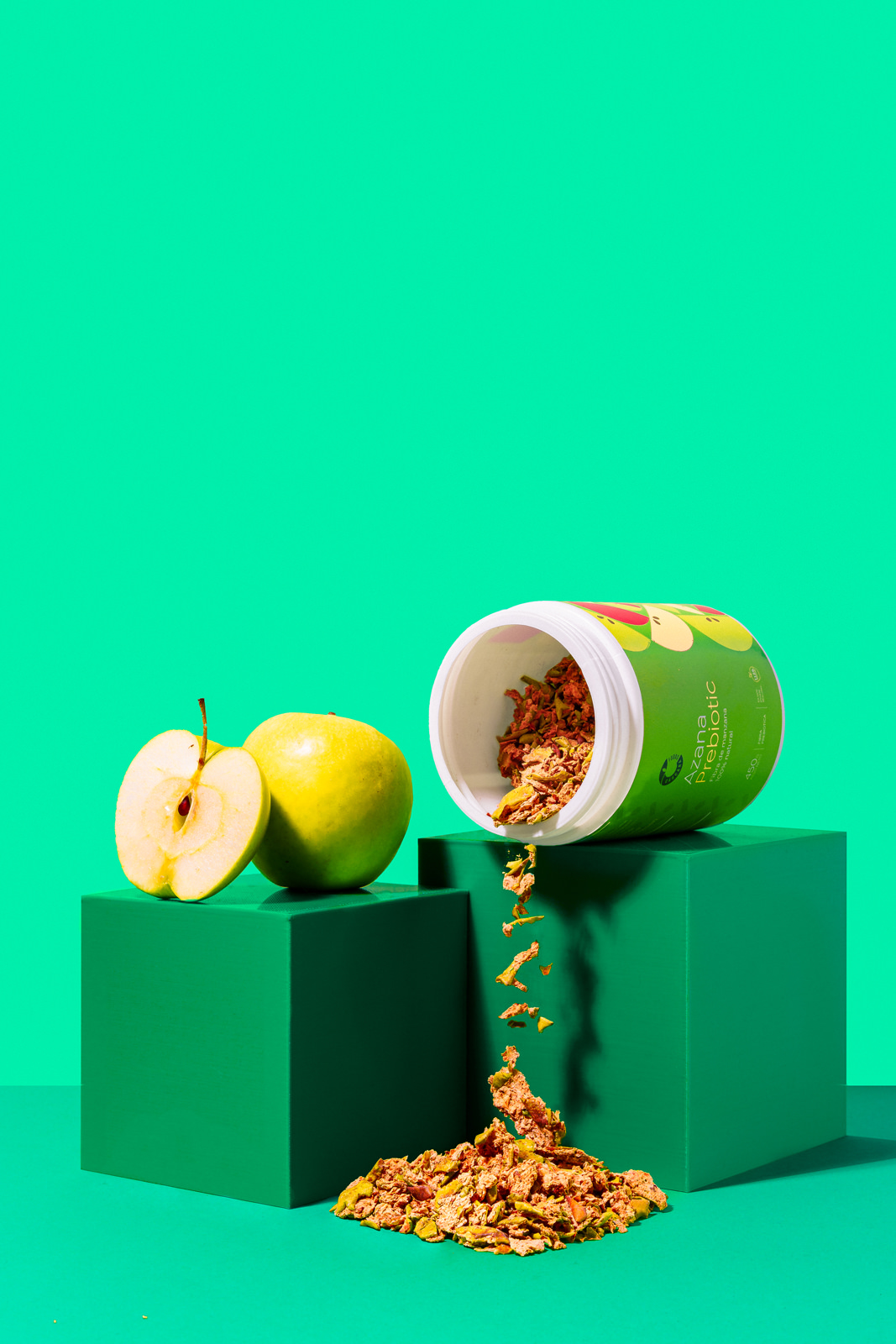 Fotografía comercial producto suplemento fruta fondo verde Chile