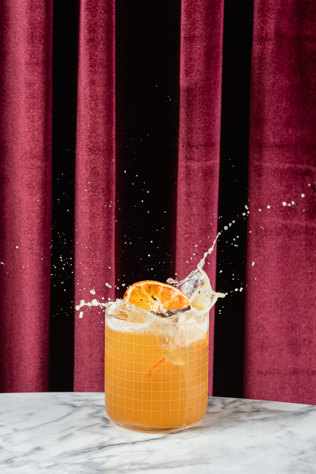 Fotografía gastronómica cóctel cítrico splash bar Santiago